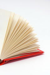 Red hardcover book with flipping pages